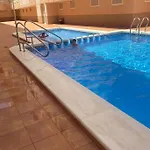 Апартаменты Acogedor En Zona Residencial Con Piscina Торевьиа