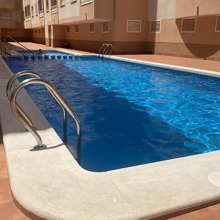 Acogedor En Zona Residencial Con Piscina Appartement